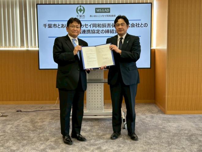 協定締結時の写真